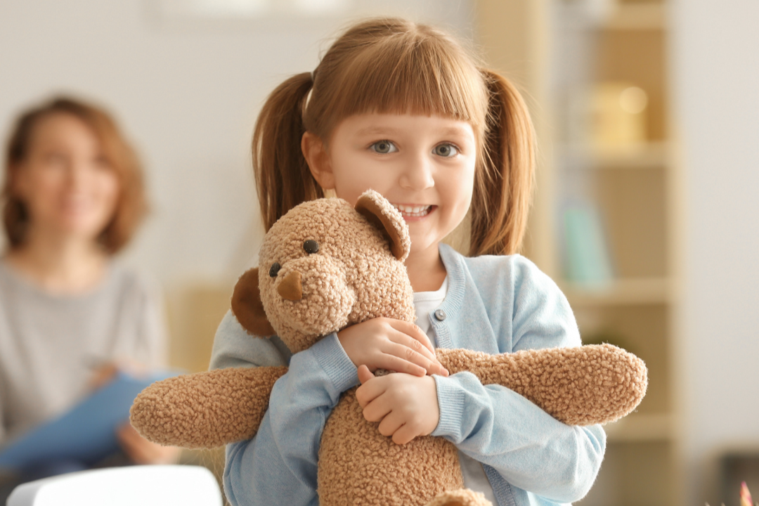 Child with teddy